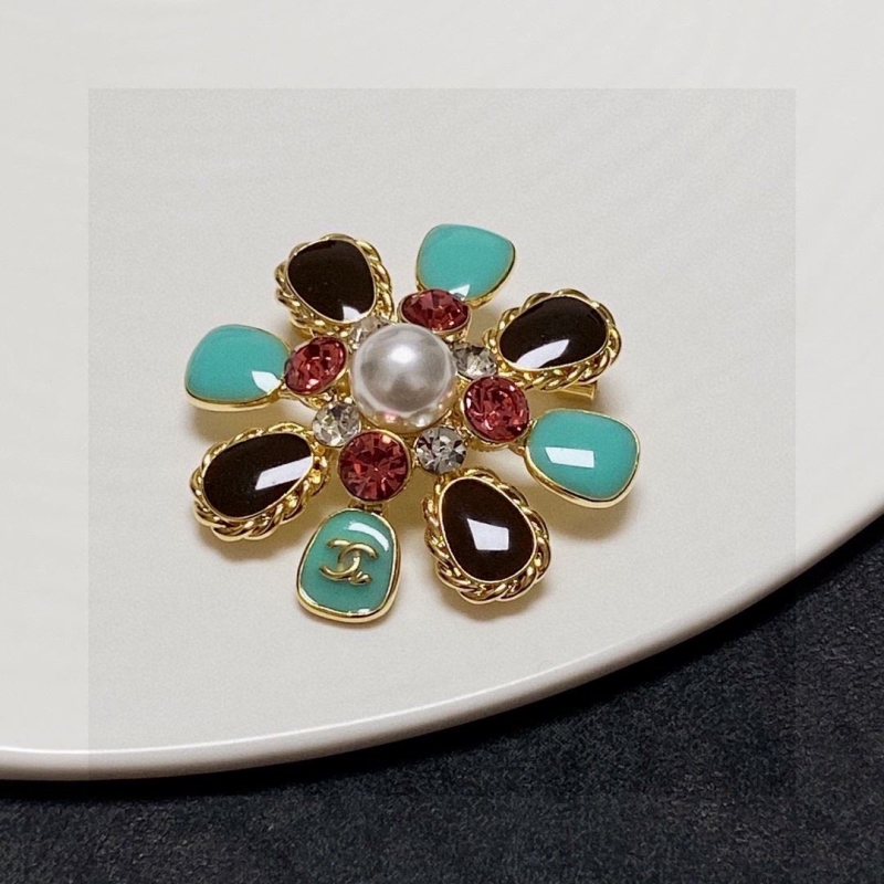 Ch*el brooches